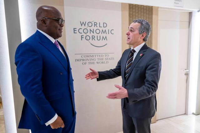President of the Democratic Republic of Congo Felix Tshisekedi (L) meets with Member of the Swiss Federal Council Ignazio Cassis prior to a bilateral meeting on the sidelines of the 56th annual meeting of the World Economic Forum (WEF) in Davos, Switzerland, on January 21, 2026. The World Economic Forum takes place in Davos from January 19 to January 23, 2026. (Photo by LAURENT GILLIERON / POOL / AFP)