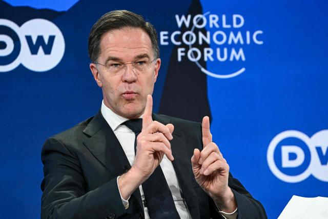 NATO Secretary General Mark Rutte gestures as he speaks during the World Economic Forum (WEF) annual meeting in Davos on January 21, 2026. The World Economic Forum takes place in Davos from January 19 to January 23, 2026. (Photo by Fabrice COFFRINI / AFP)