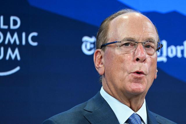 BlackRock chairman and WEF interim co-chair Larry Fink speaks during the World Economic Forum (WEF) annual meeting in Davos on January 21, 2026. The World Economic Forum takes place in Davos from January 19 to January 23, 2026. (Photo by Fabrice COFFRINI / AFP)