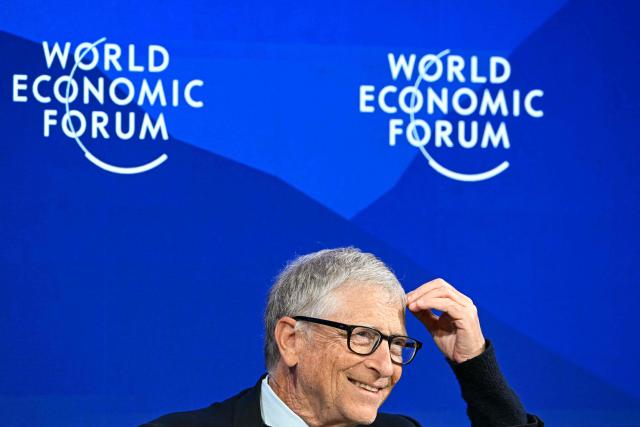 TOPSHOT - Microsoft co-founder and US philanthropist Bill Gates gestures as he speaks during the World Economic Forum (WEF) annual meeting in Davos on January 21, 2026. The World Economic Forum takes place in Davos from January 19 to January 23, 2026. (Photo by Fabrice COFFRINI / AFP)