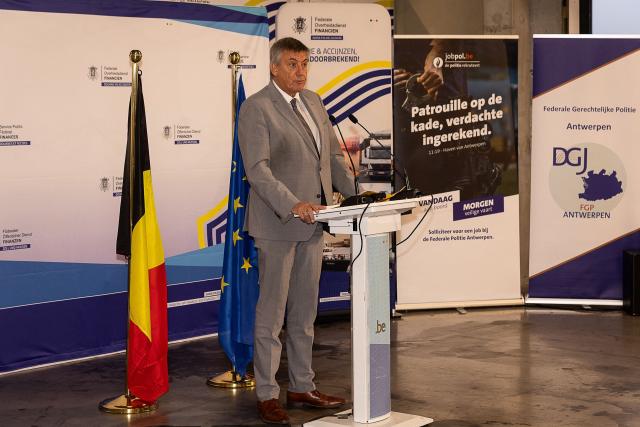 Vice-prime minister and Minister of Finance, Combating Tax Fraud, Pensions, National Lottery and Cultural Institutions Jan Jambon delivers a speech during a press conference by the General Administration of Customs and Excise on the annual drug figures for 2025 at the port of Antwerp, in Beveren, near Antwerp on January 21, 2026. (Photo by JAMES ARTHUR GEKIERE / Belga / AFP) / Belgium OUT