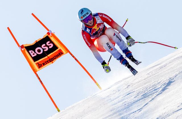 Switzerland's Alexis Monney races during a training session for the Men's Downhill event of the FIS Alpine Skiing World Cup in Kitzbuehel, Austria, on January 21, 2026. (Photo by Joe Klamar / AFP)