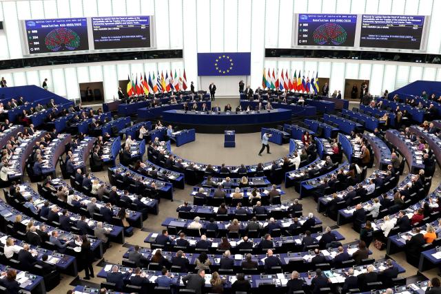 This photograph shows screens displaying the results of the vote on the legal referral concerning the Mercosur deal, and a general view of the hemicycle during a voting session at the European Parliament in Strasbourg, eastern France, on January 21, 2026. The European Union's parliament voted on January 21, 2026 to refer a freshly signed trade deal with South American bloc Mercosur to the EU's top court, casting a veil of legal uncertainty over the accord. (Photo by FREDERICK FLORIN / AFP)