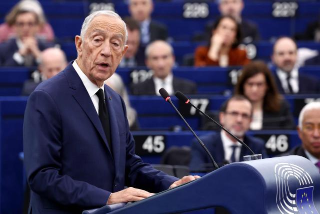 Portuguese President Marcelo Rebelo de Sousa delivers a speech to members of European Parliament during a formal sitting for the 40th anniversary of Spain and Portugal joining the EU  with the EU flag in the background in Strasbourg, eastern France, on January 21, 2026. (Photo by FREDERICK FLORIN / AFP)