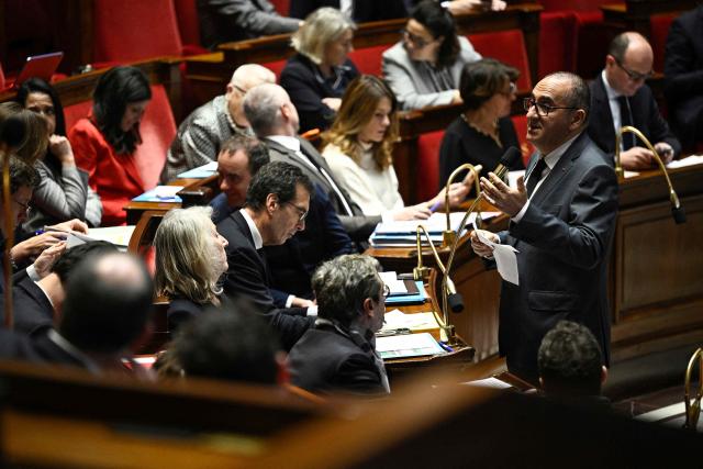France's Interior Minister Laurent Nunez addresses MPs during a session of questions to the government at The National Assembly, France's lower house parliament, in Paris on January 21, 2026. (Photo by JULIEN DE ROSA / AFP)