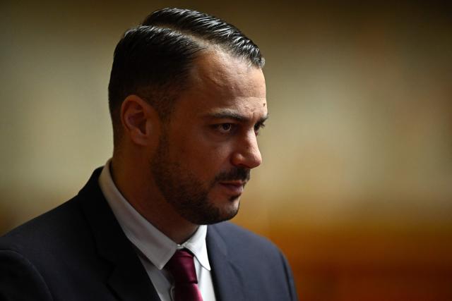 La France Insoumise - Nouveau Front Populaire's MP Sebastien Delogu looks on as he attends a session of questions to the government at The National Assembly, France's lower house parliament, in Paris on January 21, 2026. (Photo by JULIEN DE ROSA / AFP)