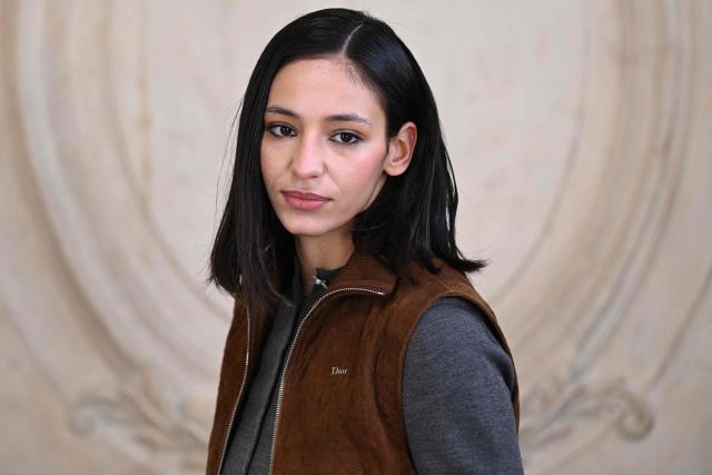 French actress Nadia Melliti poses for a photocall ahead of the Dior Menswear Ready-to-wear Fall-Winter 2026/2027 collection as part of the Men Paris Fashion Week in Paris on January 21, 2026.  (Photo by Blanca CRUZ / AFP)