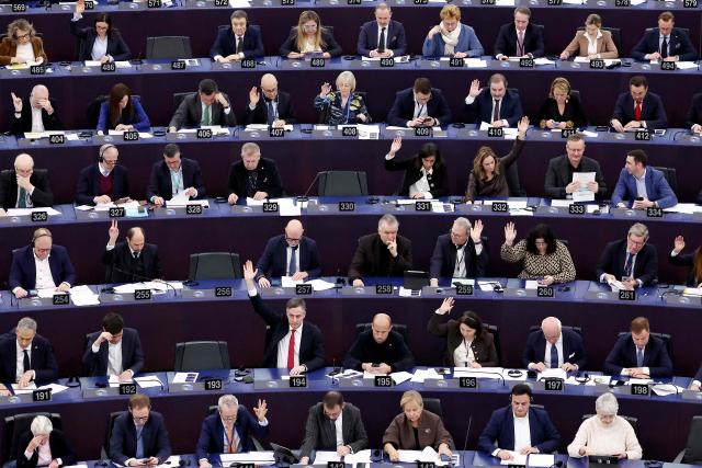 Members of the European Parliament take part in a voting session during a plenary session at the European Parliament in Strasbourg, eastern France, on January 21, 2026. (Photo by FREDERICK FLORIN / AFP)