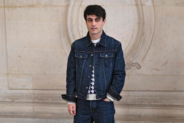French actor Julien De Saint Jean poses for a photocall ahead of the Dior Menswear Ready-to-wear Fall-Winter 2026/2027 collection as part of the Men Paris Fashion Week in Paris on January 21, 2026.  (Photo by Blanca CRUZ / AFP)
