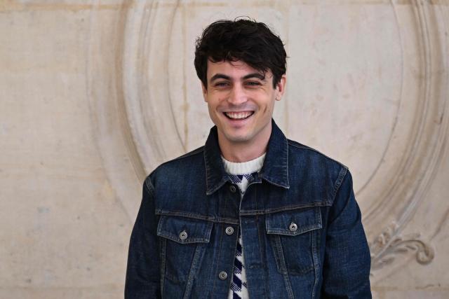 French actor Julien De Saint Jean poses for a photocall ahead of the Dior Menswear Ready-to-wear Fall-Winter 2026/2027 collection as part of the Men Paris Fashion Week in Paris on January 21, 2026.  (Photo by Blanca CRUZ / AFP)