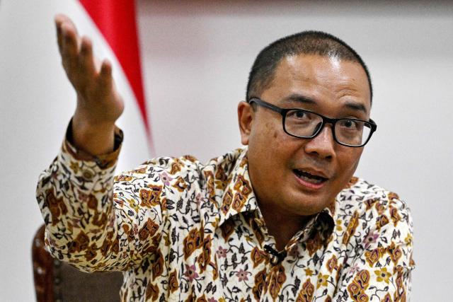 Indonesian Ambassador to Cambodia Santo Darmosumarto speaks during an interview with AFP at the Indonesian Embassy in Phnom Penh on January 21, 2026. More than 1,400 Indonesians have left cyberscam networks in Cambodia in the last five days, Jakarta said on January 21, after Phnom Penh pledged a fresh crackdown on the illicit trade. (Photo by TANG CHHIN Sothy / AFP)