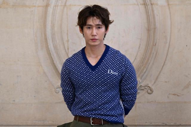 South Korean model Seung Ju Han poses for a photocall ahead of the Dior Menswear Ready-to-wear Fall-Winter 2026/2027 collection as part of the Men Paris Fashion Week in Paris on January 21, 2026.  (Photo by Blanca CRUZ / AFP)