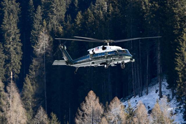 The Marine One helicopter leaves after dropping US President at Davos Landing Zone on January 21, 2026. The World Economic Forum takes place in Davos from January 19 to January 23, 2026. (Photo by INA FASSBENDER / AFP)