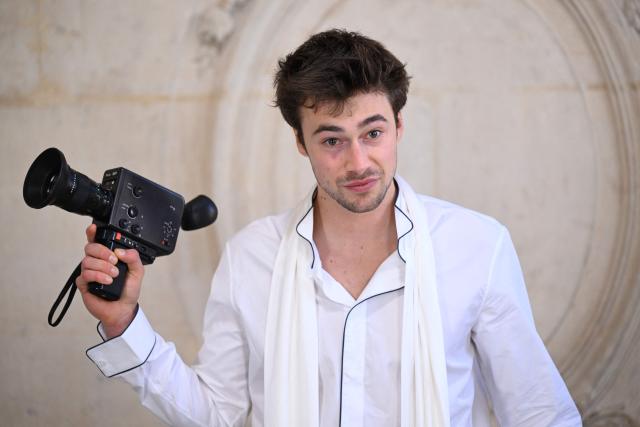 Brazilian influencer Luca Apple poses for a photocall ahead of the Dior Menswear Ready-to-wear Fall-Winter 2026/2027 collection as part of the Men Paris Fashion Week in Paris on January 21, 2026.  (Photo by Blanca CRUZ / AFP)
