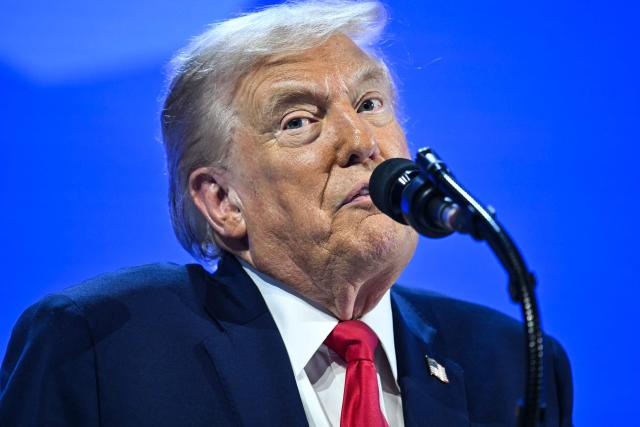 US President Donald Trump delivers a special address during the World Economic Forum (WEF) annual meeting in Davos on January 21, 2026. The World Economic Forum takes place in Davos from January 19 to January 23, 2026. (Photo by Mandel NGAN / AFP)