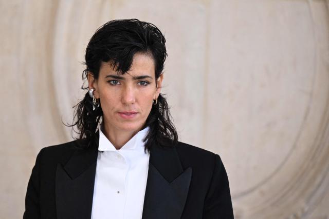 DJ and music producer Hen Yanni poses for a photocall ahead of the Dior Menswear Ready-to-wear Fall-Winter 2026/2027 collection as part of the Men Paris Fashion Week in Paris on January 21, 2026.  (Photo by Blanca CRUZ / AFP)