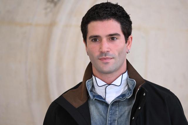 Spanish model Marc Forne poses for a photocall ahead of the Dior Menswear Ready-to-wear Fall-Winter 2026/2027 collection as part of the Men Paris Fashion Week in Paris on January 21, 2026.  (Photo by Blanca CRUZ / AFP)