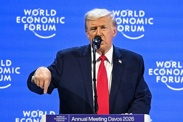 US President Donald Trump gestures as he delivers a special address during the World Economic Forum (WEF) annual meeting in Davos on January 21, 2026. The World Economic Forum takes place in Davos from January 19 to January 23, 2026. (Photo by Fabrice COFFRINI / AFP)
