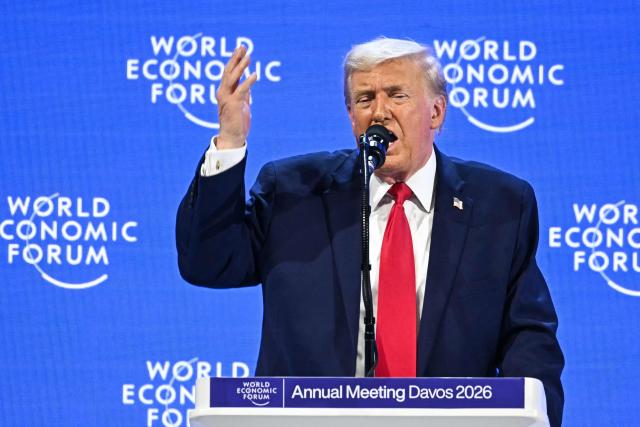 US President Donald Trump gestures as he delivers a special address during the World Economic Forum (WEF) annual meeting in Davos on January 21, 2026. The World Economic Forum takes place in Davos from January 19 to January 23, 2026. (Photo by Fabrice COFFRINI / AFP)