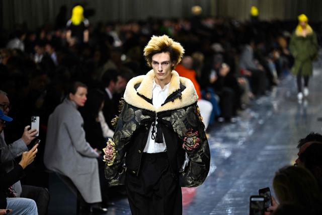 A model presents a creation by Dior for the Menswear Ready-to-wear Fall-Winter 2026/2027 collection as part of the Men Paris Fashion Week in Paris on January 21, 2026.  (Photo by Blanca CRUZ / AFP)