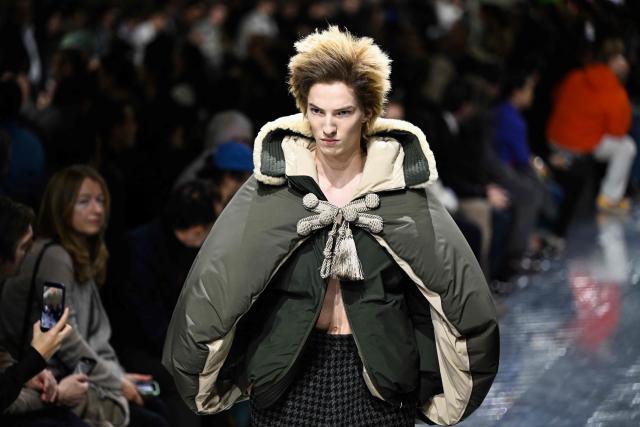 A model presents a creation by Dior for the Menswear Ready-to-wear Fall-Winter 2026/2027 collection as part of the Men Paris Fashion Week in Paris on January 21, 2026.  (Photo by Blanca CRUZ / AFP)