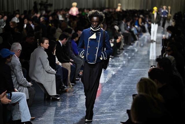 A model presents a creation by Dior for the Menswear Ready-to-wear Fall-Winter 2026/2027 collection as part of the Men Paris Fashion Week in Paris on January 21, 2026.  (Photo by Blanca CRUZ / AFP)