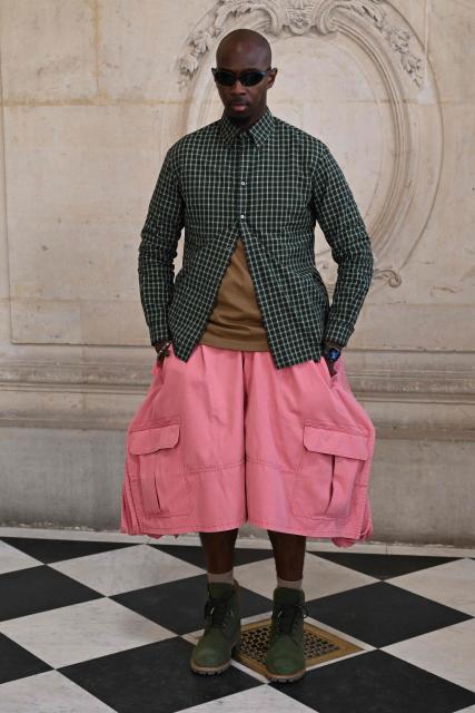 Fashion designer Jean-Jacques Ndjoli poses for a photocall ahead of the Dior Menswear Ready-to-wear Fall-Winter 2026/2027 collection as part of the Men Paris Fashion Week in Paris on January 21, 2026.  (Photo by Blanca CRUZ / AFP)