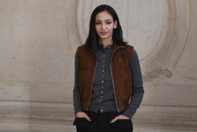 French actress Nadia Melliti poses for a photocall ahead of the Dior Menswear Ready-to-wear Fall-Winter 2026/2027 collection as part of the Men Paris Fashion Week in Paris on January 21, 2026.  (Photo by Blanca CRUZ / AFP)