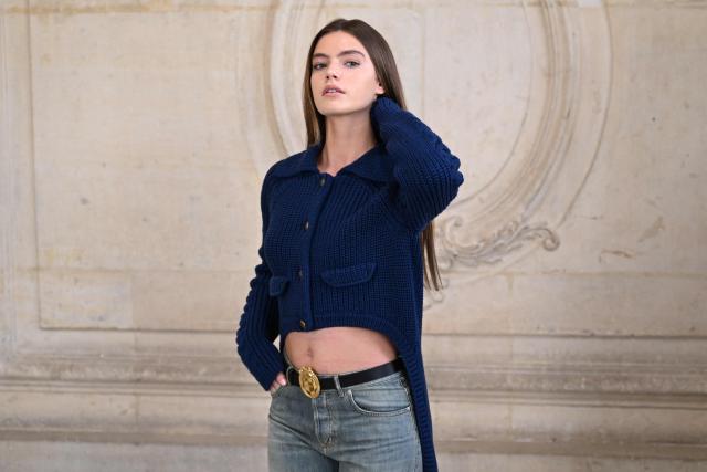 British actress Florence Hunt poses for a photocall ahead of the Dior Menswear Ready-to-wear Fall-Winter 2026/2027 collection as part of the Men Paris Fashion Week in Paris on January 21, 2026.  (Photo by Blanca CRUZ / AFP)