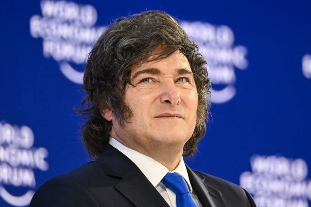 Argentina’s President Javier Milei looks on during the World Economic Forum (WEF) annual meeting in Davos on January 21, 2026. The World Economic Forum takes place in Davos from January 19 to January 23, 2026. (Photo by Fabrice COFFRINI / AFP)