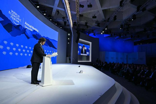 Argentina’s President Javier Milei speaks during the World Economic Forum (WEF) annual meeting in Davos on January 21, 2026. The World Economic Forum takes place in Davos from January 19 to January 23, 2026. (Photo by Fabrice COFFRINI / AFP)