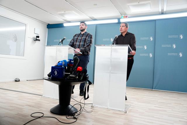 Members of Greenlandic government (Naalakkersuisut) Peter Borg and Aqqaluaq Biilmann Egede (R) hold a press conference in the Naalakkersuisut in Nuuk, Greenland, on January 21, 2026. (Photo by Mads Claus Rasmussen / Ritzau Scanpix / AFP) / Denmark OUT
