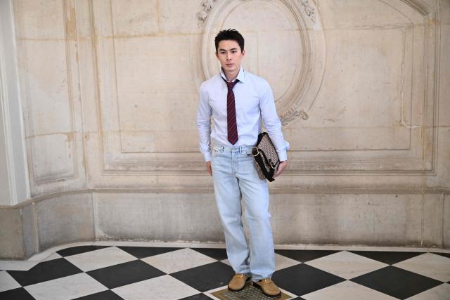 Dongsheng Li  poses for a photocall ahead of the Dior Menswear Ready-to-wear Fall-Winter 2026/2027 collection as part of the Men Paris Fashion Week in Paris on January 21, 2026.  (Photo by Blanca CRUZ / AFP)