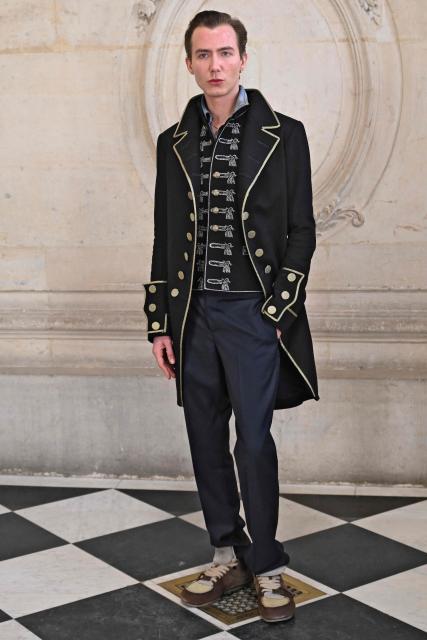 French model Paul Hameline poses for a photocall ahead of the Dior Menswear Ready-to-wear Fall-Winter 2026/2027 collection as part of the Men Paris Fashion Week in Paris on January 21, 2026.  (Photo by Blanca CRUZ / AFP)