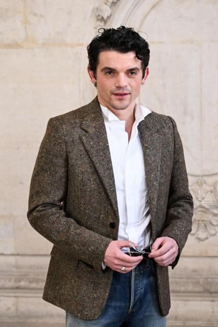 British actor Edward Bluemel poses for a photocall ahead of the Dior Menswear Ready-to-wear Fall-Winter 2026/2027 collection as part of the Men Paris Fashion Week in Paris on January 21, 2026.  (Photo by Blanca CRUZ / AFP)