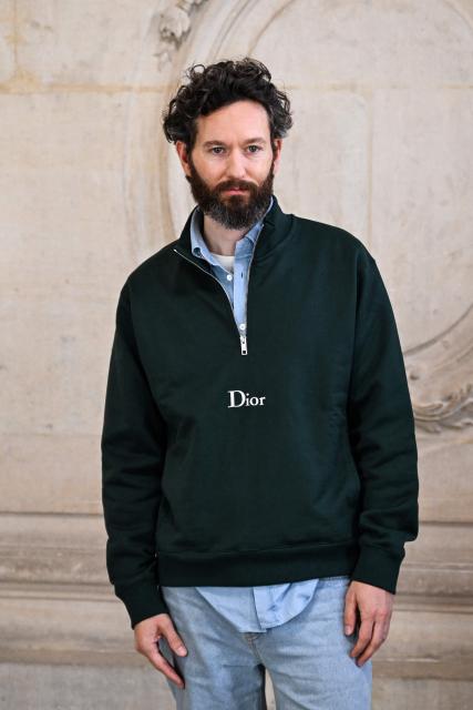 Fashion influencer Isaac Hindin Miller poses for a photocall ahead of the Dior Menswear Ready-to-wear Fall-Winter 2026/2027 collection as part of the Men Paris Fashion Week in Paris on January 21, 2026.  (Photo by Blanca CRUZ / AFP)