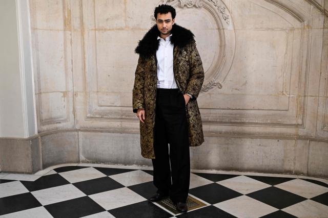 British actor Archie Madekwe poses for a photocall ahead of the Dior Menswear Ready-to-wear Fall-Winter 2026/2027 collection as part of the Men Paris Fashion Week in Paris on January 21, 2026.  (Photo by Blanca CRUZ / AFP)