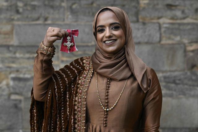 Zahrah Mahmood, President of Ramblers Scotland poses with their medal after being appointed a Member of the Order of the British Empire (MBE) at an investiture ceremony at the Palace of Holyroodhouse in Edinburgh on January 21, 2026. (Photo by Lesley Martin / POOL / AFP)