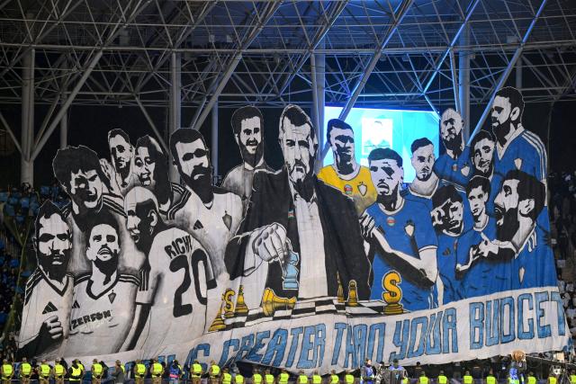 A huge banner of Qarabag is seen prior to the UEFA Champions League league phase football match between Qarabag and Frankfurt at the Tofiq Bahramov Republican Stadium in Baku on January 21, 2026. (Photo by Tofik BABAYEV / AFP)