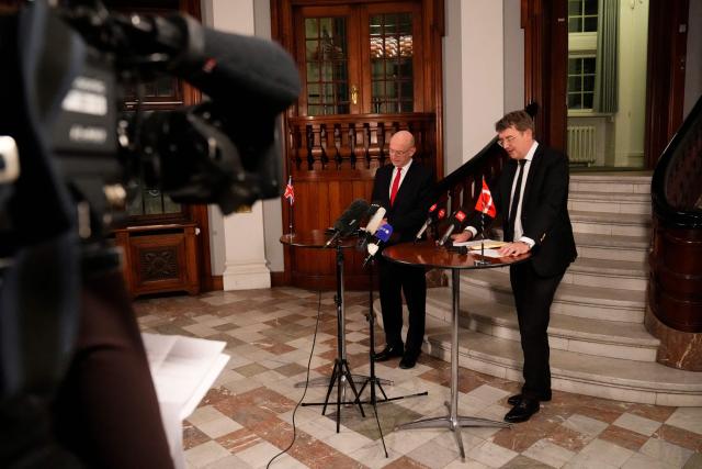 Denmark's Defense Minister Troels Lund Poulsen and the Britain's Defence Secretary John Healey (L) meet the press at a doorstep at the Ministry of Defense in Copenhagen, Denmark, January 21, 2026. (Photo by Thomas Traasdahl / Ritzau Scanpix / AFP) / Denmark OUT