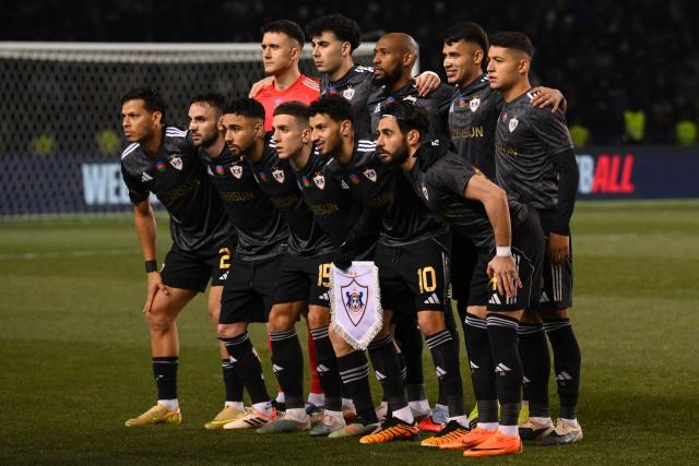 Qarabag's players pose for a team picture prior to the UEFA Champions League league phase football match between Qarabag and Frankfurt at the Tofiq Bahramov Republican Stadium in Baku on January 21, 2026. (Photo by Tofik BABAYEV / AFP)