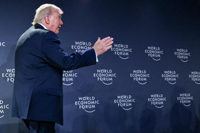 US President Donald Trump gestures during a reception with business leaders on the sidelines of the World Economic Forum (WEF) annual meeting in Davos on January 21, 2026. The World Economic Forum takes place in Davos from January 19 to January 23, 2026. (Photo by Mandel NGAN / AFP)