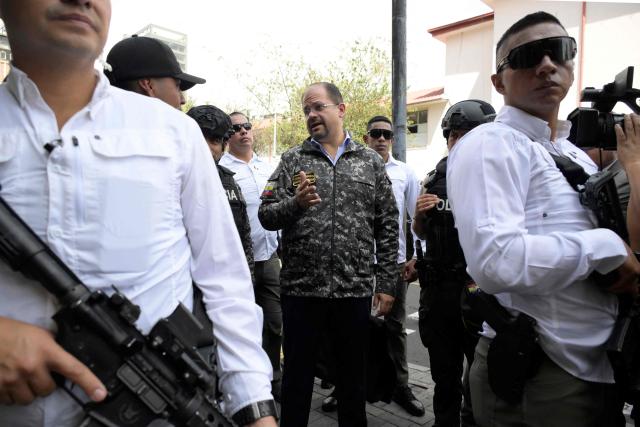 Ecuador's Interior Minister John Reimberg participates in a security operation in Quito's financial district on January 21, 2026. (Photo by Rodrigo BUENDIA / AFP)