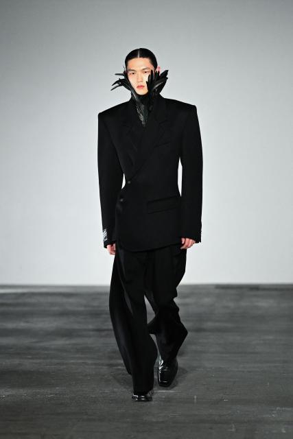 A model presents a creation by Egonlab for the Menswear Ready-to-wear Fall-Winter 2026/2027 collection as part of the Men Paris Fashion Week in Paris on January 21, 2026.  (Photo by Blanca CRUZ / AFP)