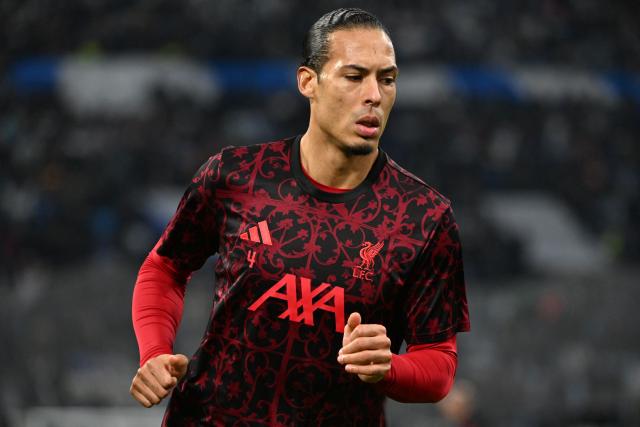 Liverpool's Dutch defender #04 Virgil van Dijk warms up prior to the UEFA Champions League, league phase day 7, football match between Olympique de Marseille (OM) and Liverpool FC at the Stade Velodrome in Marseille, southern France, on January 21, 2026. (Photo by Miguel MEDINA / AFP)