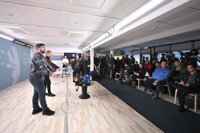 Members of Greenlandic government (Naalakkersuisut) Peter Borg (L) and Aqqaluaq B. Egede hold a press conference in the Naalakkersuisut in Nuuk, Greenland, on January 21, 2026. (Photo by Jonathan NACKSTRAND / AFP)