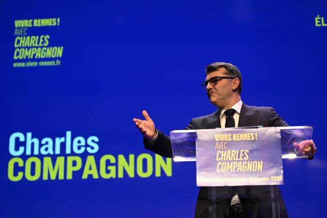 Candidate for the Horizons party for the upcoming Rennes municipal elections Charles Compagnon gestures as he delivers a speech at the Youth and Culture Centre in the Brequigny neighbourhood of Rennes, western France, on January 21, 2026. (Photo by Damien MEYER / AFP)
