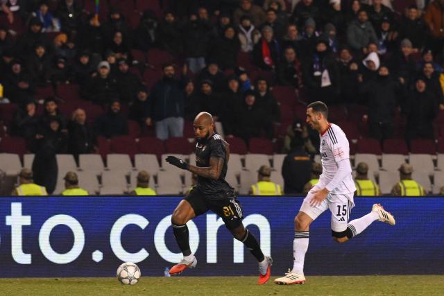 Qarabag's Colombian defender #81 Kevin Medina and Frankfurt's Tunisian midfielder #15 Ellyes Skhiri vie for the ball during the UEFA Champions League league phase football match between Qarabag and Frankfurt at the Tofiq Bahramov Republican Stadium in Baku on January 21, 2026. (Photo by Tofik BABAYEV / AFP)