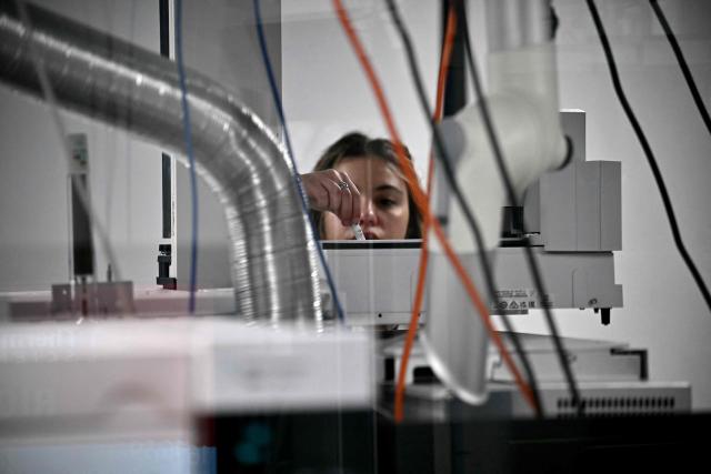 A person works in the laboratories of the Italian Sports Medicine Federation (FMSI) headquarters and antidoping laboratory, in Rome on January 2026. The facility, one of 30 worldwide accredited by the WADA (World Antidoping Agency), is located on the outskirts of the capital, making Italy a point of reference not only for the upcoming Olympic and Paralympic Games Milano Cortina 2026, but also for the international sports system. (Photo by FILIPPO MONTEFORTE / AFP)