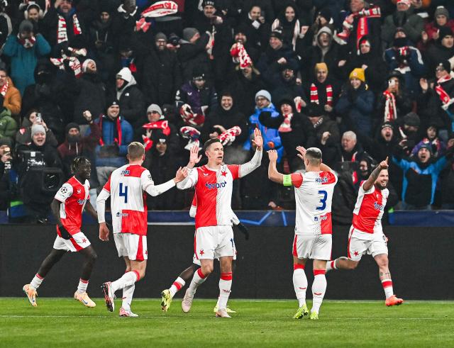 Slavia Prague's Czech forward #09 Vasil Kusej (R) celebrates his 1-0 during in the UEFA Champions League football match between Slavia Prague (CZE) and FC Barcelona (ESP) in Prague, Czech Republic on January  21, 2026. (Photo by Michal Cizek / AFP)